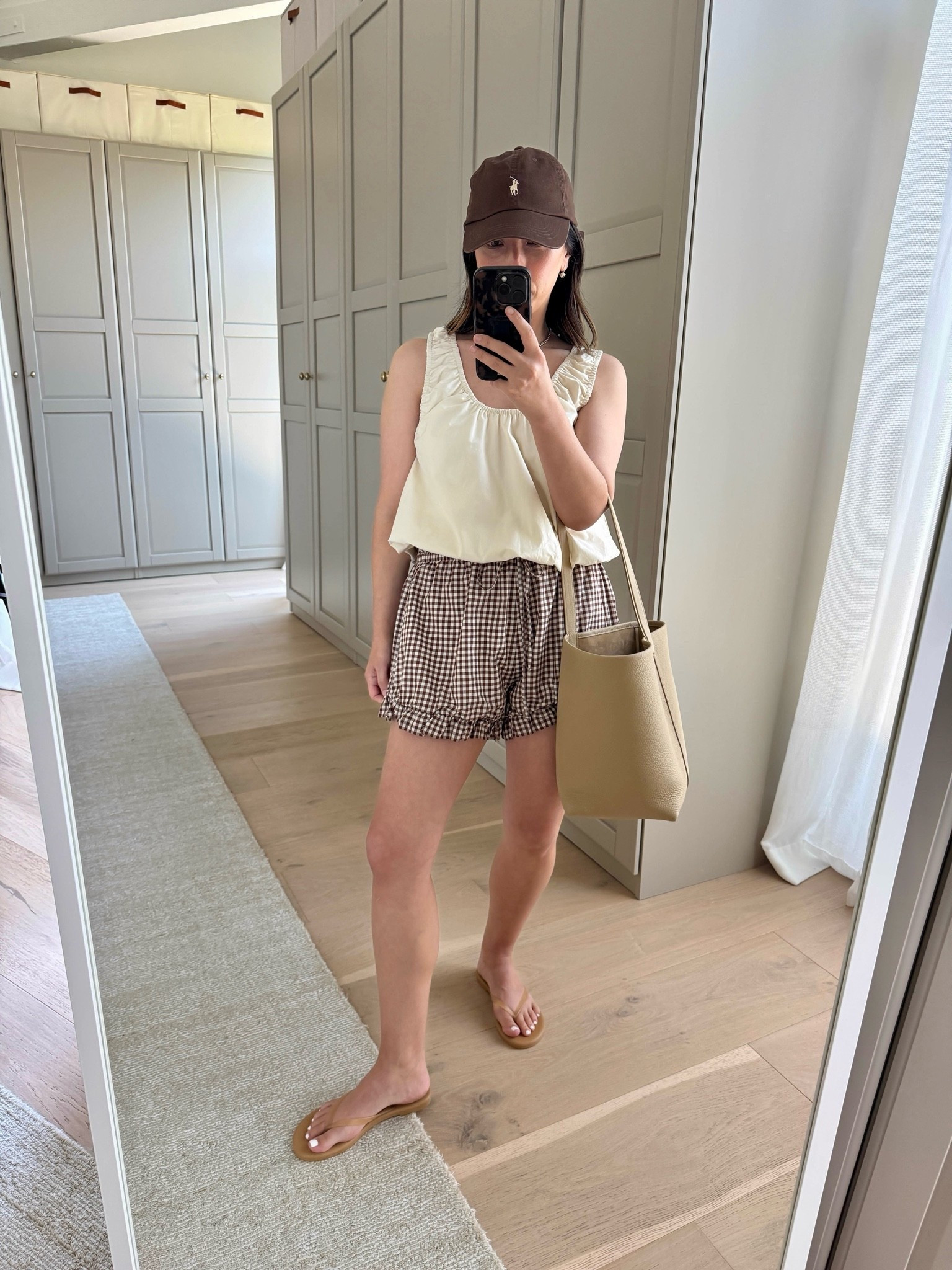 easy summer outfit to beat the heat ☁️

Zara tank small 
Posse shorts large - run very small 
Tkee sandals 5 
The Row bag medium
Polo Ralph Lauren hat 
Electric Picks earrings 
Dorsey James necklace 15”

summer outfits, summer style, petite style

#LTKmomlife #LTKootd #LTKPetite
