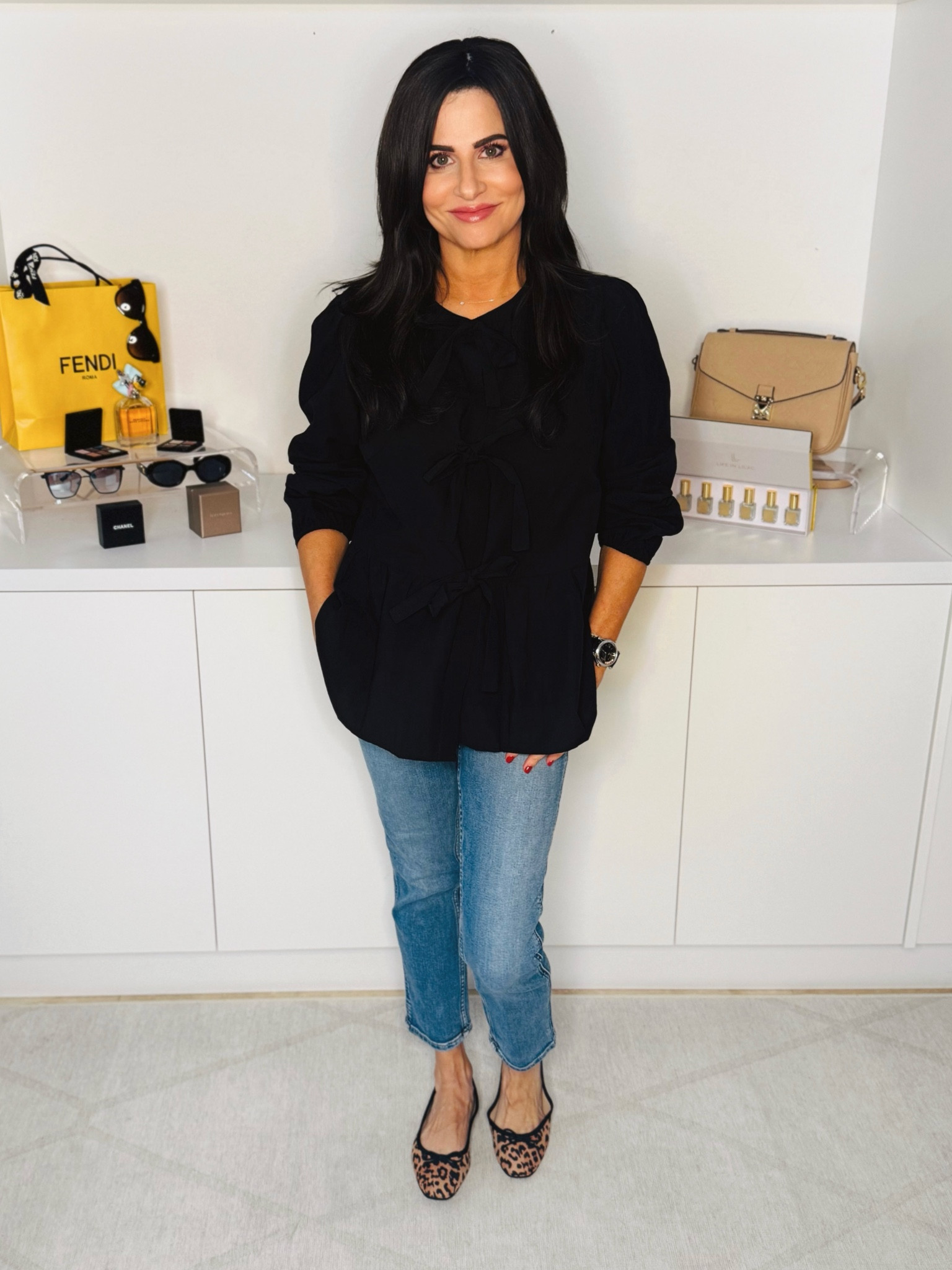 Such a cute tie top. Watch my try on to see the bow ties . You can wear a bra and it is covered by a tie bow. Wearing a sm . Jeans 25 , sling backs TTS 

#LTKFindsUnder50 #LTKStyleTip #LTKOver40