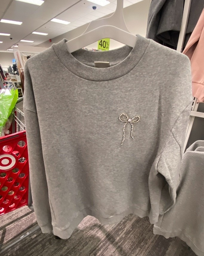 This bow  sweatshirt is so sweet. Think of how much this could be paired with: metallic, leather, jean, or cozy leggings for a casual look.  



#giftforher #target #bow #bowsweatshirt #LTKU 

#LTKFindsUnder50 #LTKOver40 #LTKSeasonal