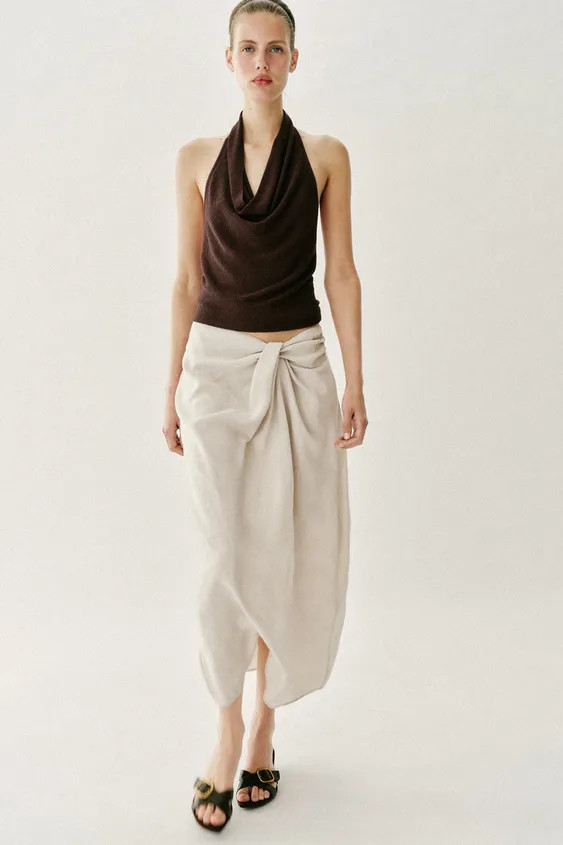Skirt with front knot and ruching. Back hidden in-seam zip closure. | Zara US