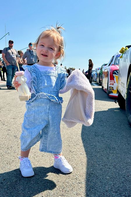 Pit road style! I love these cute ruffle overalls even if they are a bit short on her now (they are 12 mo and she is 15 mo and super tall for her age!) Pair it with a white onesie and some cute sneakers  💖 Also these are the best bottles to teach little ones to drink from a straw, Lennix has been doing it since 8 months!

#LTKbaby #LTKkids #LTKunder50
