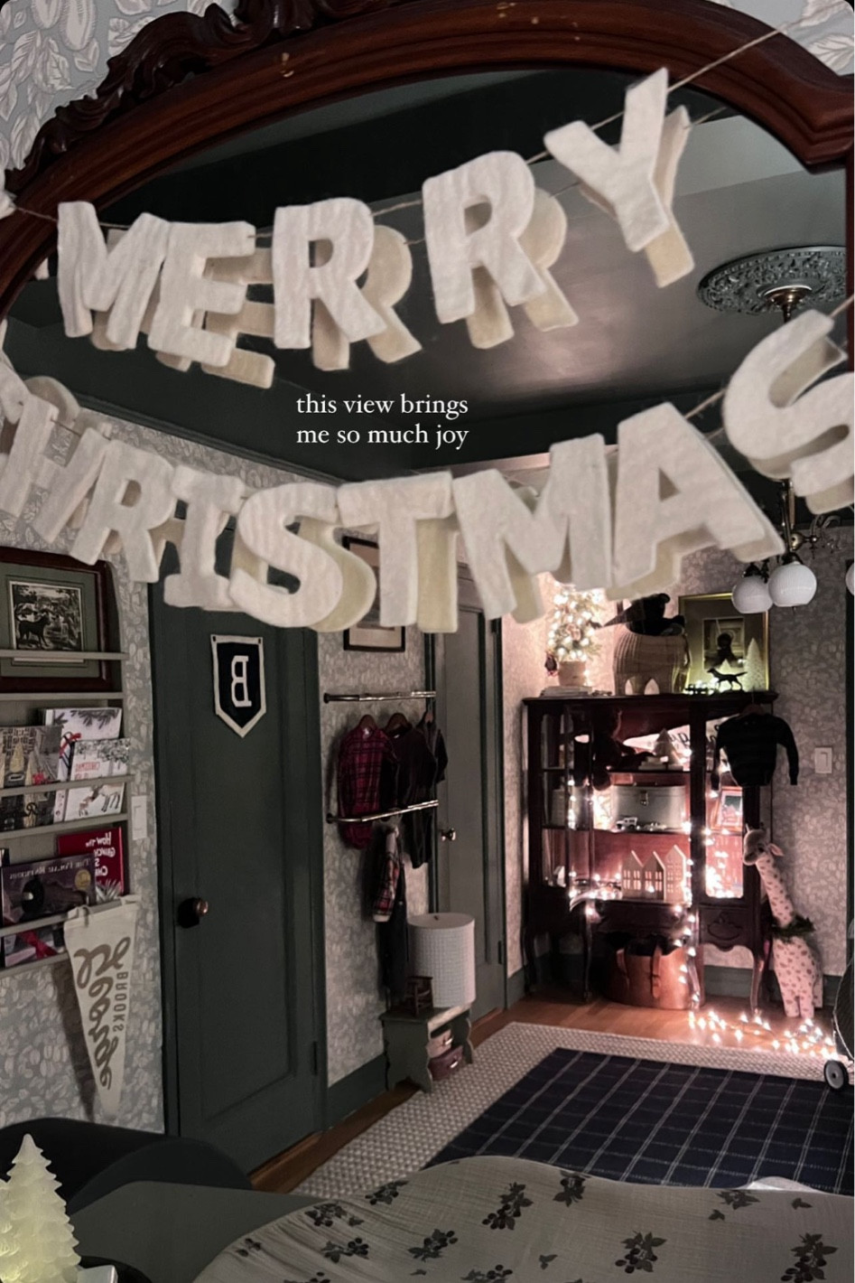 Christmas nursery decor - antique cabinet (linked similar one), wall decor, bookshelf, curtain rods as clothing racks

#LTKhome #LTKbaby #LTKHoliday