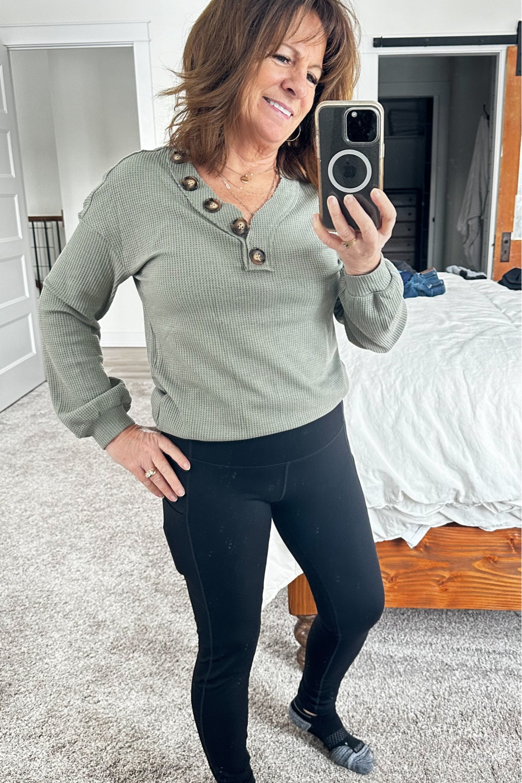 Olive green waffle knit top with black leggings with side pockets

#LTKfitness #LTKworkwear #LTKstyletip