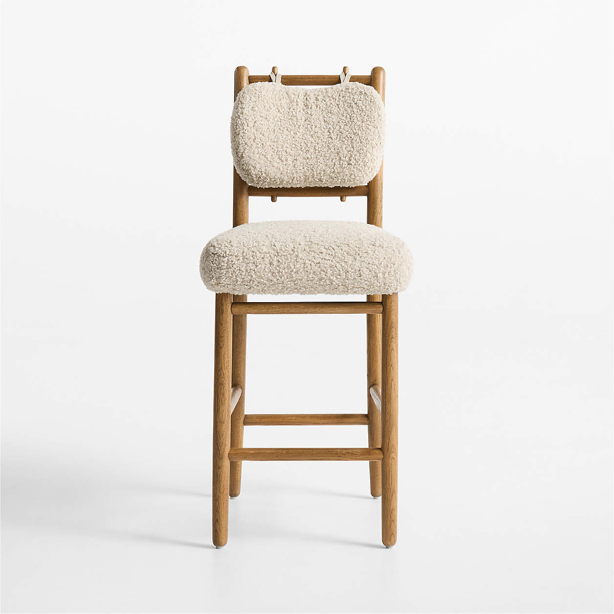 Pierre Light Brown Oak Wood Dining Counter Stool with Faux Shearling | Crate & Barrel | Crate & Barrel