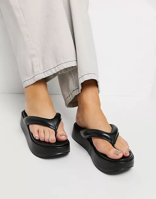 ASOS DESIGN Ferris chunky flip flop sandals in black | ASOS (Global)