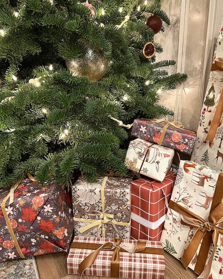 All wrapped & ready to go! 

#wrappingpaper #ribbon #velvetribbon #christmaswrap #christmas #paper #bow 

#LTKsalealert #LTKHoliday #LTKSeasonal