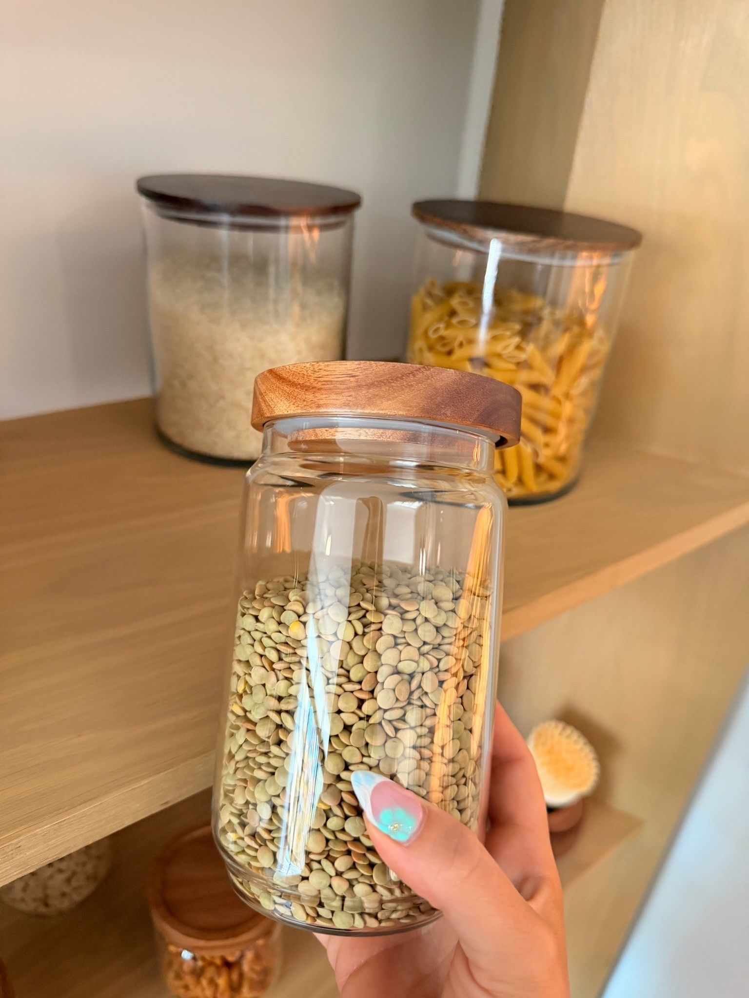 Kitchen organization but make it cute 🤍 These glass storage jars with wood lids are SUCH a simple way to make your pantry or counters look instantly more put together. I linked a few jar options + sticker label sets so you can mix, match, and organize your kitchen your way! ✨

I love using these for sugar, flour, snacks, pasta & all the random little pantry things 🫶 

#LTKHome #KitchenOrganization #PantryOrganization #HomeFinds #AmazonHome #KitchenDecor #OrganizationIdeas

#LTKdayinmylife #LTKmomlife #LTKHome