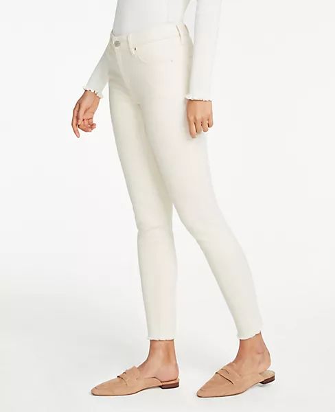 Petite Curvy Frayed Hem Performance Stretch Skinny Jeans | Ann Taylor (US)