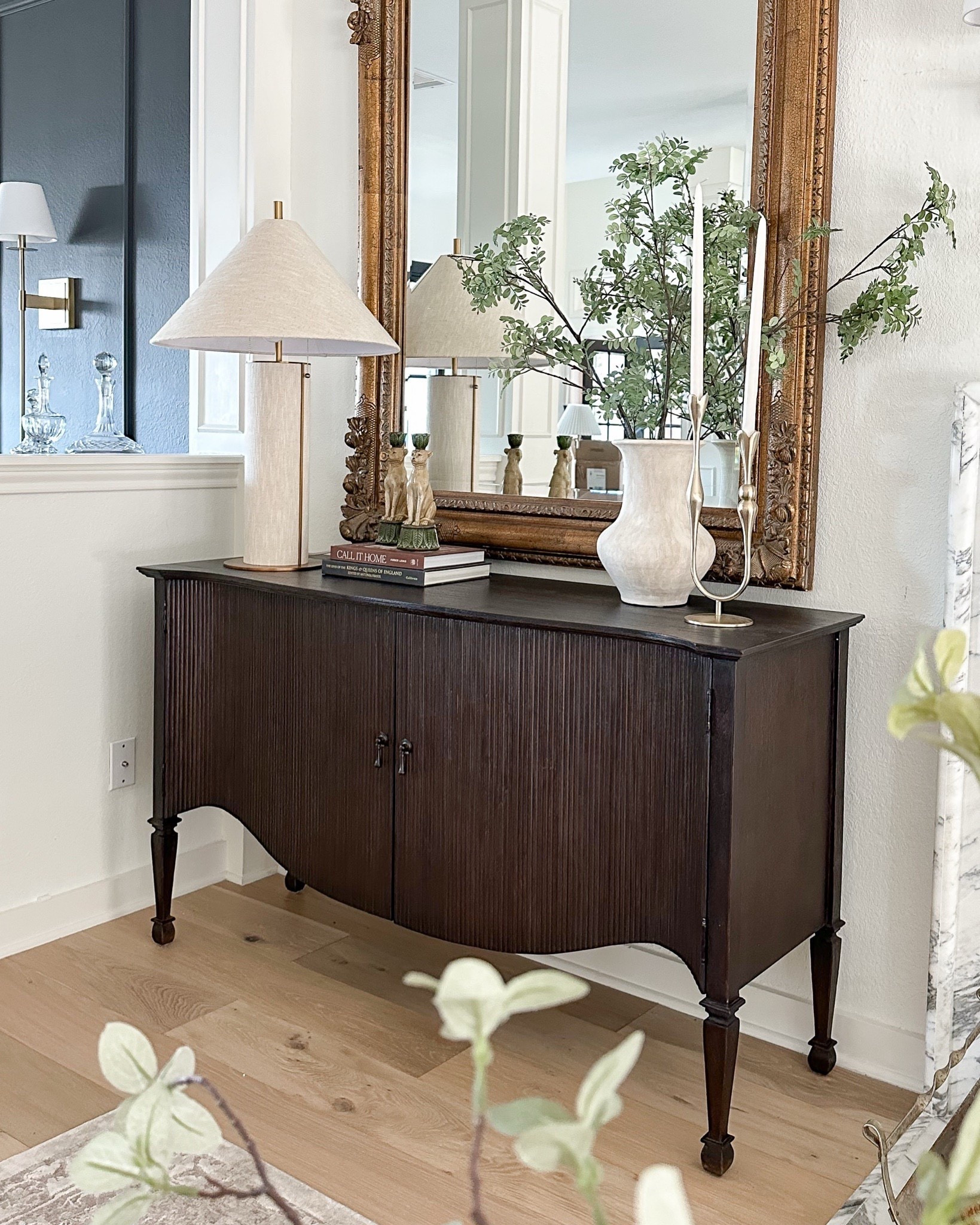 Sideboard styling in my living room featuring this lamp, vase and greenery stems, and gold candleholder!

#LTKHome #LTKStyleTip