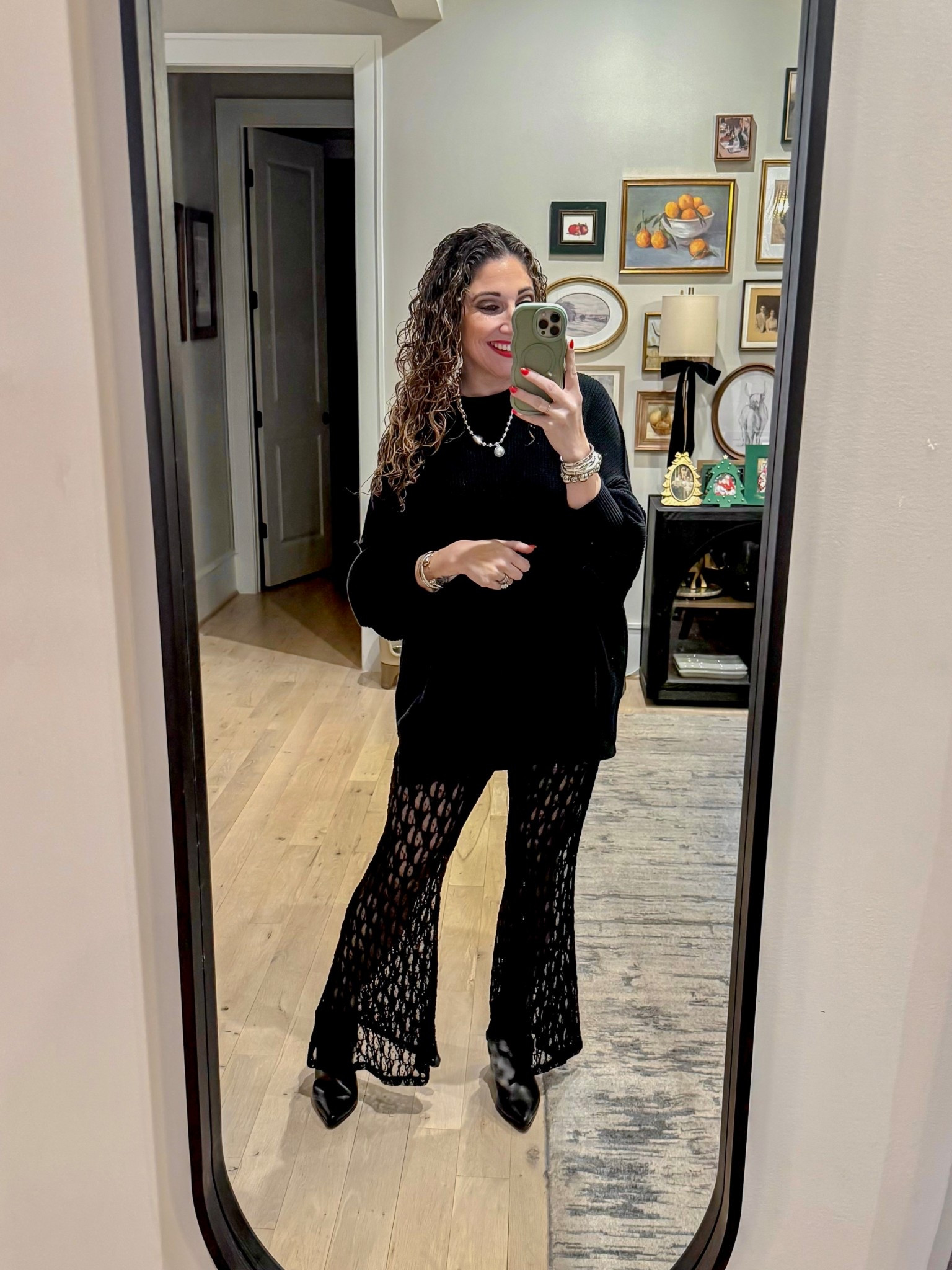 Holiday date night but make it all black monochromatic 🖤 Lace flare pants are from H&M and fit like a dream (a very comfortable dream) and oversized sweater is American Eagle. Comfy as can be and feeling like a million bucks! 
Sweater L / Pants L / Booties tts 

#LTKHoliday #LTKootd #LTKMidsize