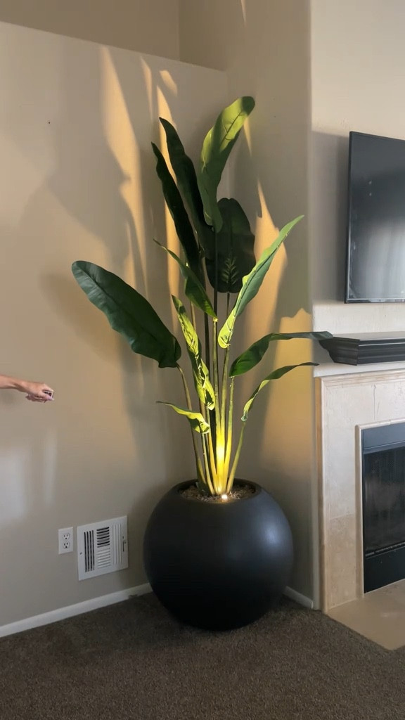 Indoor planter the perfect decor to fill this corner in the living room 🪴 Linked our exact planter, along with some others that were on our list! Faux plant is old from Target.