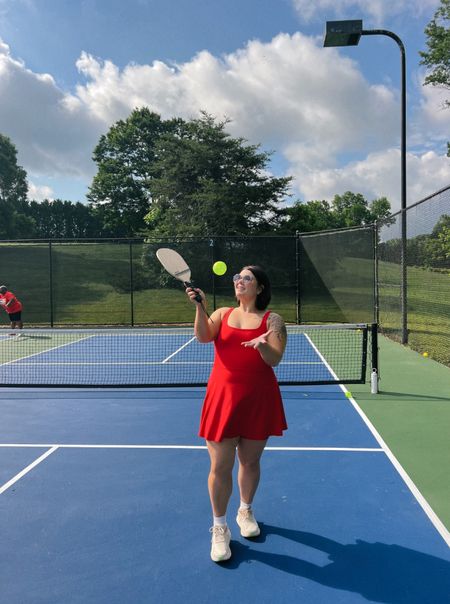 What I wore for a morning of pickle ball (I was not good lol). I ended up not liking the outfit I put on so Bonnie let me borrow her Spanx athletic dress and I loved it. I love a red. Size XL. Perfect for the midsize gal. Wore my hokas and my new $15 Target sunglasses  

#LTKTravel #LTKMidsize #LTKFitness