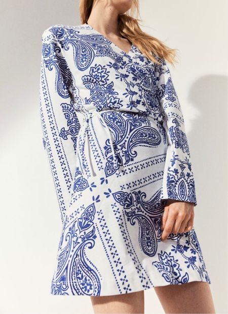 Blue and white patterned wrap dress 

#LTKfindsunder50 #LTKstyletip #LTKSeasonal