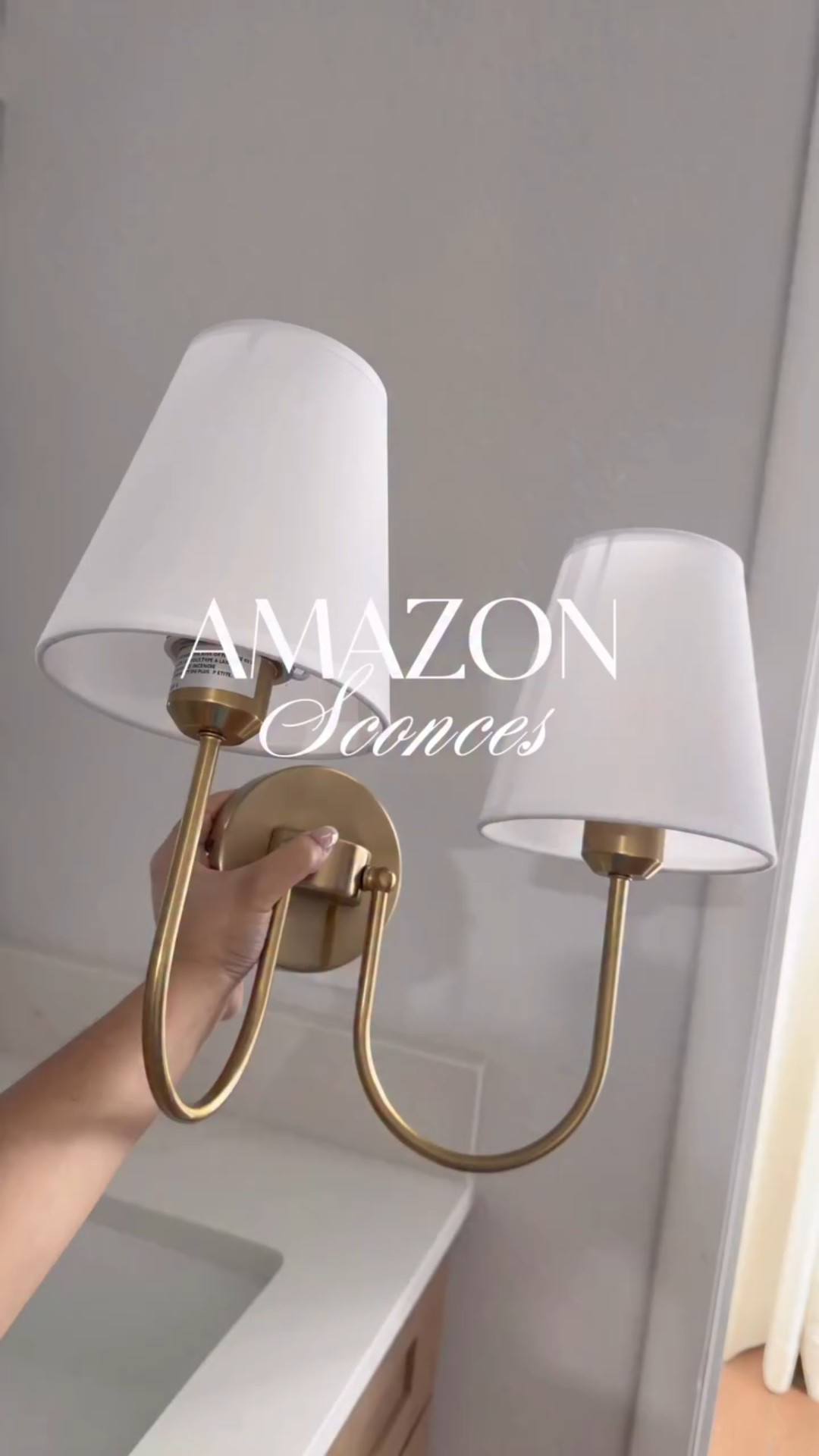 These double sconces were the final touch my bathroom needed ✨So good!

Comment “LINK” to shop this reel or check out the link in my bio to shop my home 🤎

Don’t forget to follow me for more! 🫶🏻
.
.
.
.
.
Want to shop this post? Click the link in my bio or download the free @shop.ltk app and follow me @heidyinteriors to shop this post and others! Don’t forget to turn on notifications @liketoknow.it.home 
.
.
.
.
#homedecor #neutralhomedecor #homedesign #bathroomdesign #bathroominspo