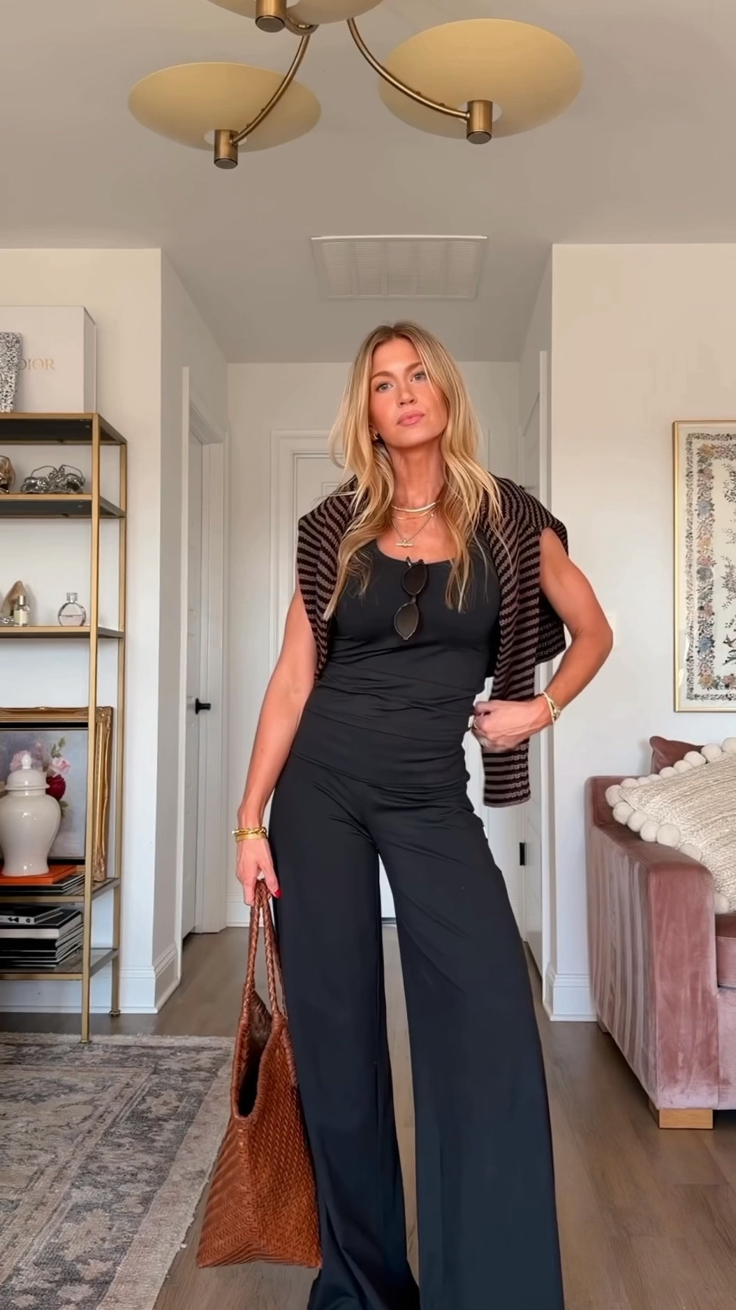 Casual fall outfit. 

Black tank: TTS, wearing XS long length
Brown and black striped roll neck sweater: runs small, size way up - I’m wearing an XL
Black wide leg lounge pants: TTS, wearing a S
Suede ballet flats: TTS

#LTKootd #LTKgrwm #LTKmomlife