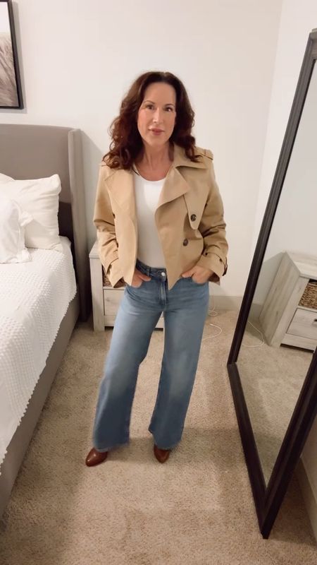 Cropped trench coat. Wide leg jeans. Fitted T-shirt. Heels. Casual outfit. Spring outfit idea. Over 40 outfit idea. H&M.

#LTKover40 #LTKfindsunder50 #LTKshoecrush