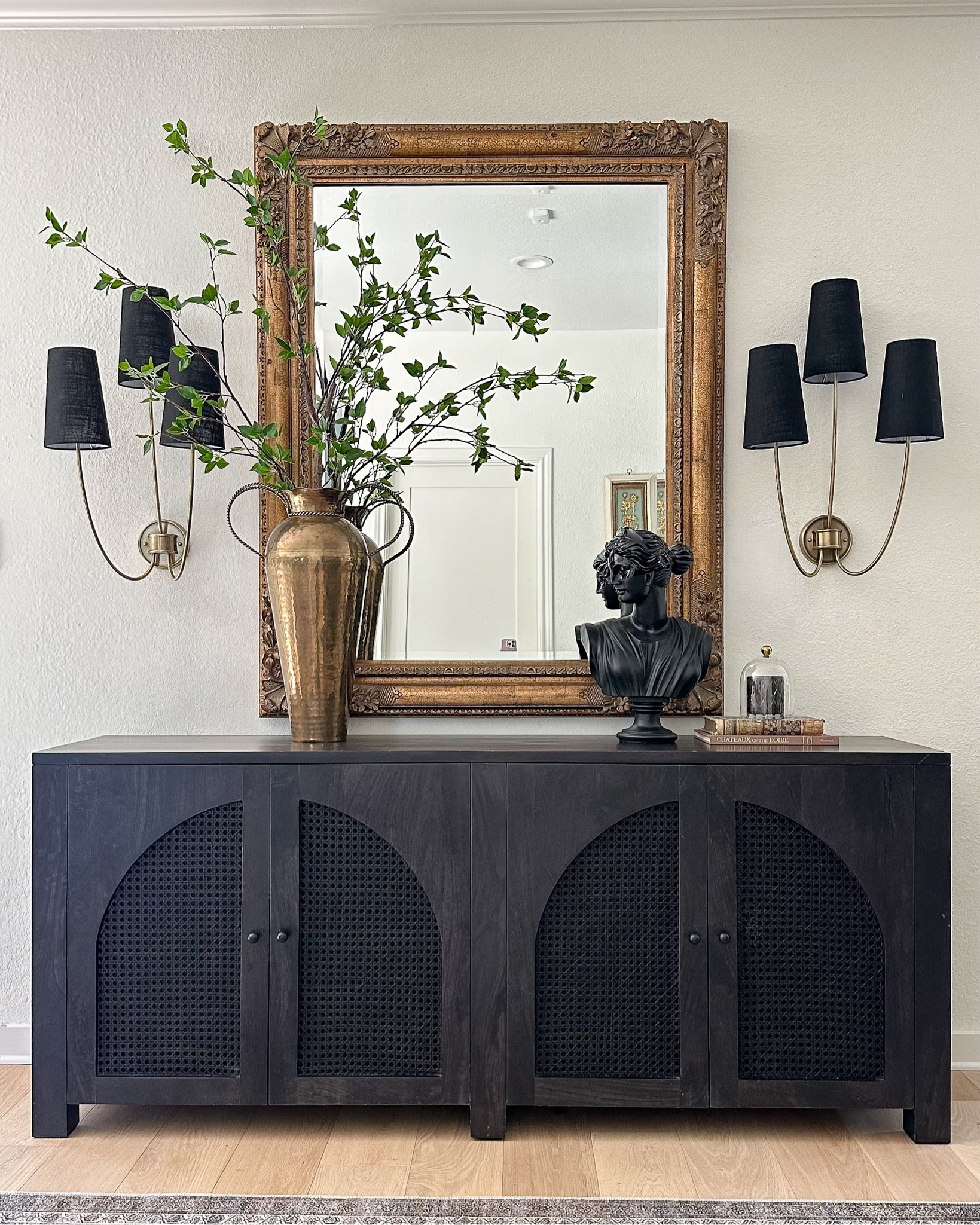 My black sideboard, scones and styling! The branches are actually a small faux tree from Amazon that I cut off the base to! The vase and mirror are vintage 🥰

#LTKhome #LTKstyletip #LTKsalealert