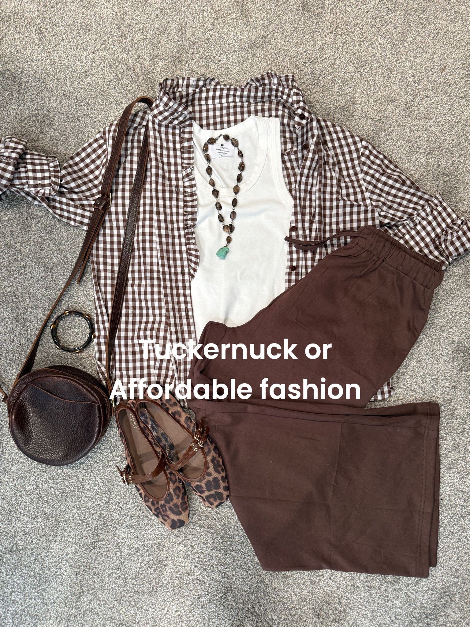 Tuckernuck or affordable fashion….

Quality and style say Tuckernuck… but the price tag says… affordable 

Gingham button up with ruffle detail tts  wearing med 

Made in California tees and tanks - ribbed tank top tts in med 

Brow elastic /tie waist wide leg knit pull on pant tts med 

The cutest two buckle leopard Mary Jane’s 
Affordable/ comfortable tts 

Leather circle bag by Portland leather 

Vintage real turquoise and smoked quartz necklace (linked similar) 

Hoop earrings  and tortoiseshell bangle bracelet 

Perfect transition outfit

#LTKootd #LTKOver40 #LTKmomlife