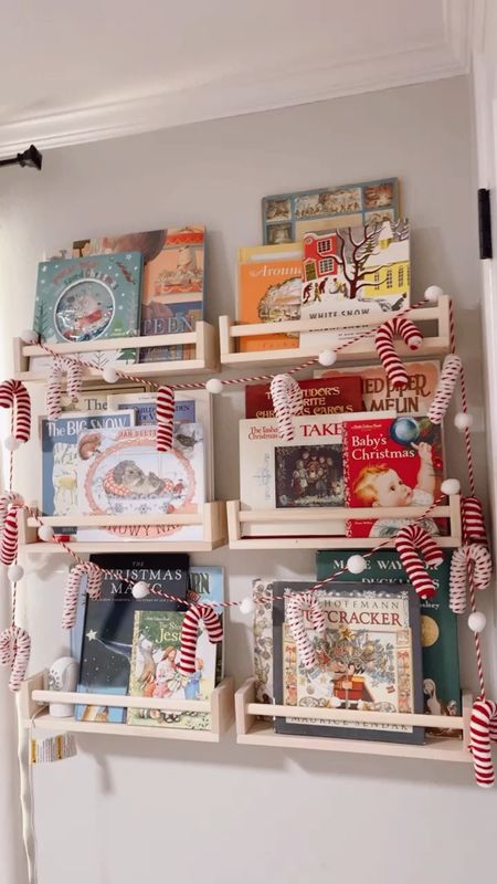 Holiday kids bookshelf - candy cane garland is from Hobby Lobby but linked a similar options. Lots of books I found off Thriftbooks.com

#LTKHoliday #LTKhome
