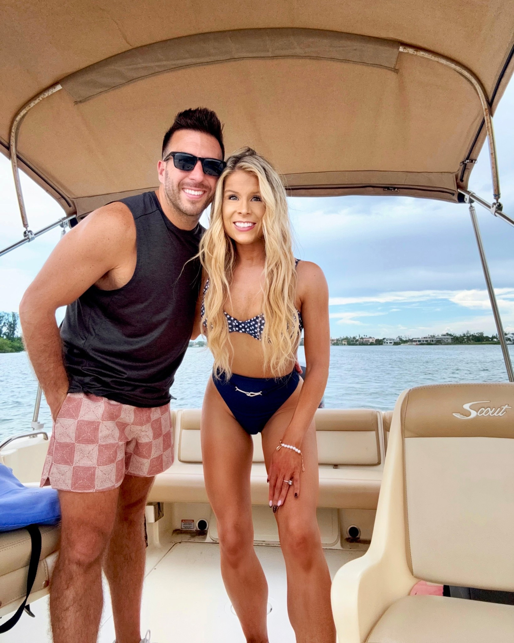 Polka Dot Bikini Top + Highwaisted Navy Bikini Bottoms styled for the beach, summer, pool, boat, resort, or vacation.

I'm wearing an XS in the polka dot underwire bikini top. I'm wearing a small in the highrise bikini bottoms. I mix + matched two bikini sets but linked the solid navy bikini set + the polka dot bikini set.

My husband is wearing a size small in the 5 in swim trunks.

#LTKPetite #LTKSwim #LTKTravel