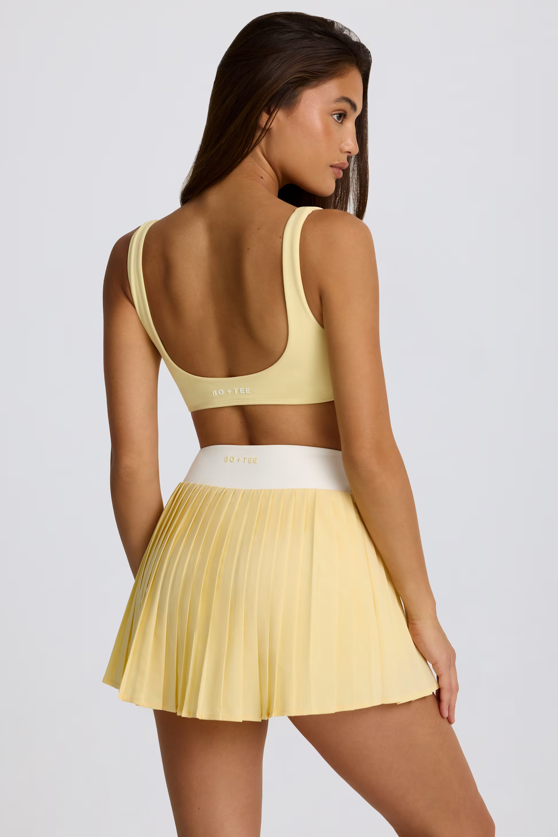 Soft Active Crossover Pleated Mini Skort in Lemon | Bo&Tee