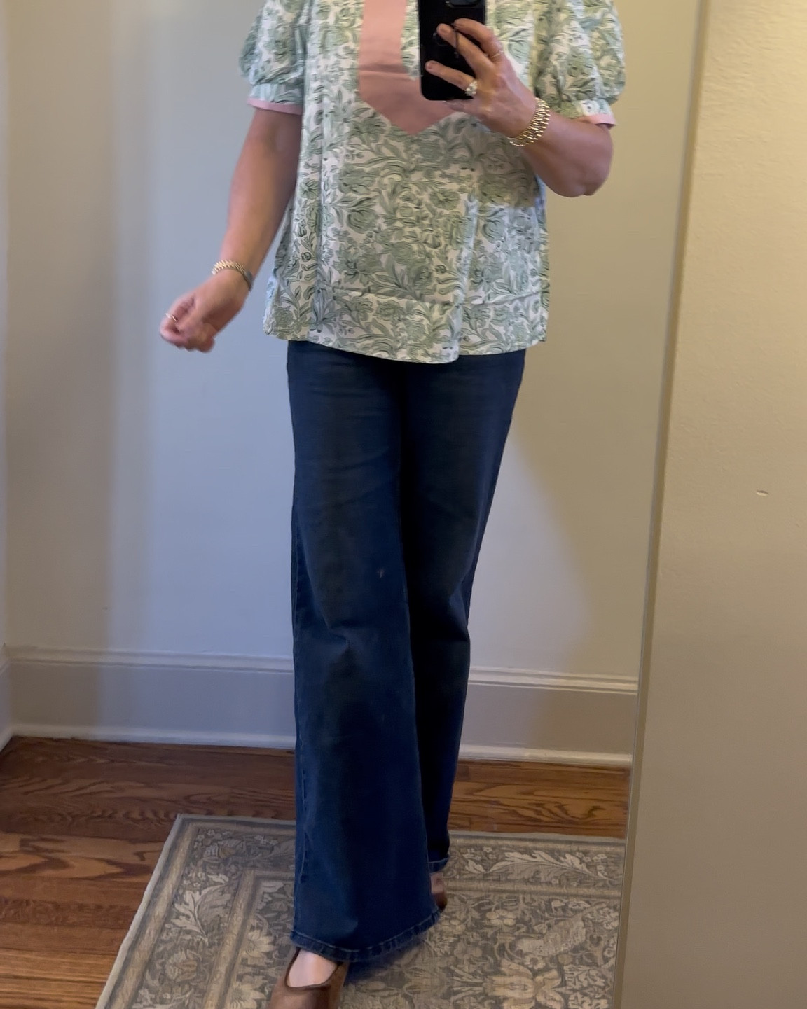 This top comes in several color ways and they all are so lovely! Perfect top for spring and summer as you can throw it on with jeans, shorts, a skirt, or linen pants and it will look amazing with everything! It is a polyester blend and I am wearing a size large so I would say it runs TTS  

#LTKSeasonal #LTKWorkwear #LTKMidsize