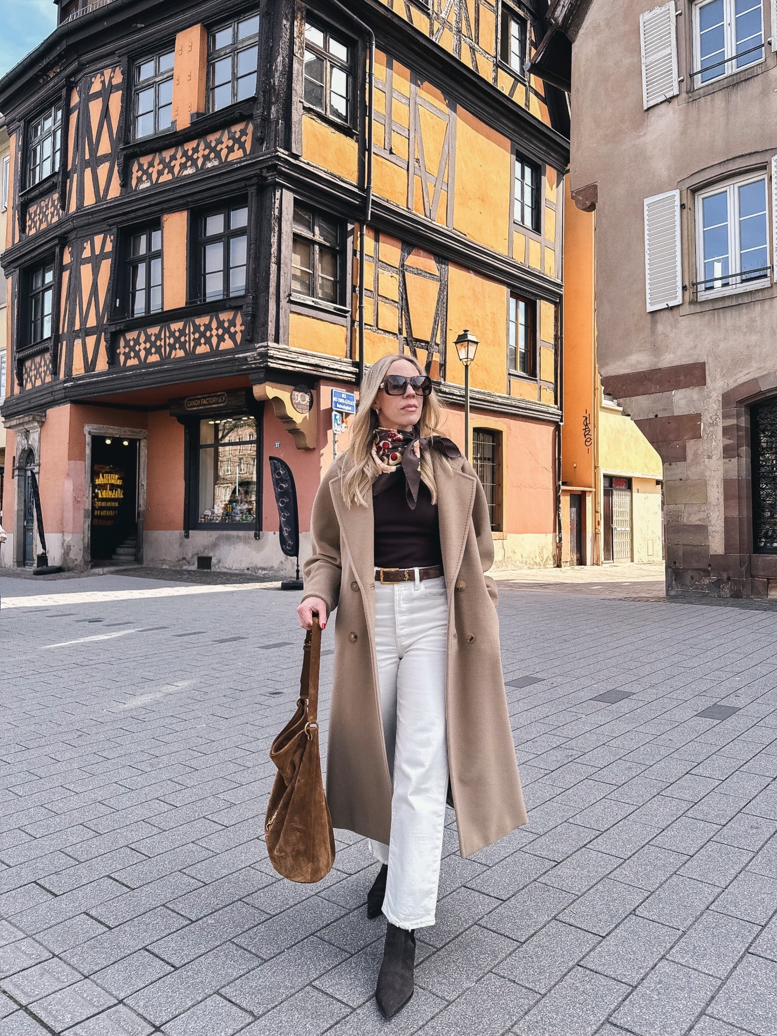 Spring travel look, camel coat, silk scarf, Levi’s white ankle jeans, white jeans with boots spring outfit, style over 40 

#LTKTravel #LTKSaleAlert #LTKOver40