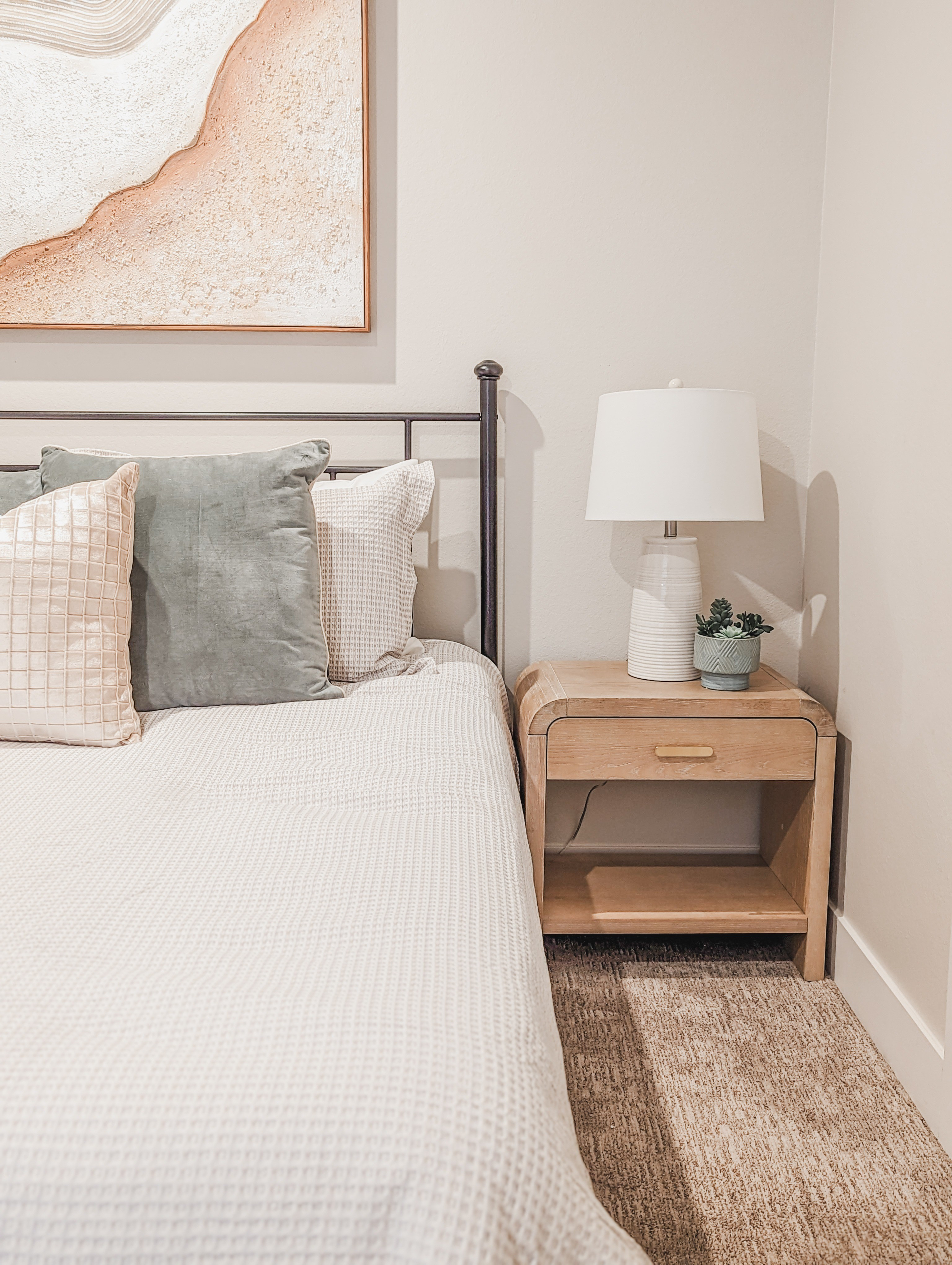 Sweet and simple! Loving this arched nightstand that we recently used in a vacation rental bedroom. The wood tone helped warm up the space, and the textural bedding added a layer or cozy.

#LTKhome
