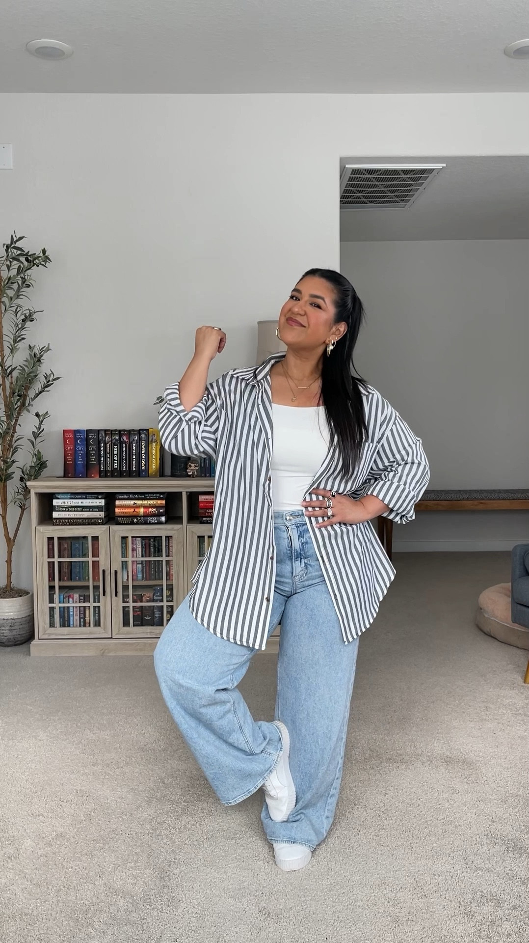 I’m 5’1”, size 12. // JEANS: from American Eagle, these are the Dreamy Drape stretch jeans in shade Salty Air. The best jeans EVER. They are so stretchy and light. I would recommend sizing down in these. They do run big! I wear the 10 short. // TANK: from Amazon, size large, true to size. double lined and stretchy. // BUTTON UP: from Amazon, shade black (it’s more of a grey). Wearing my true size large and it’s perfectly oversized! // SHOES: Pumas from Amazon, true to size.  

#LTKPetite #LTKMidsize #LTKFindsUnder50