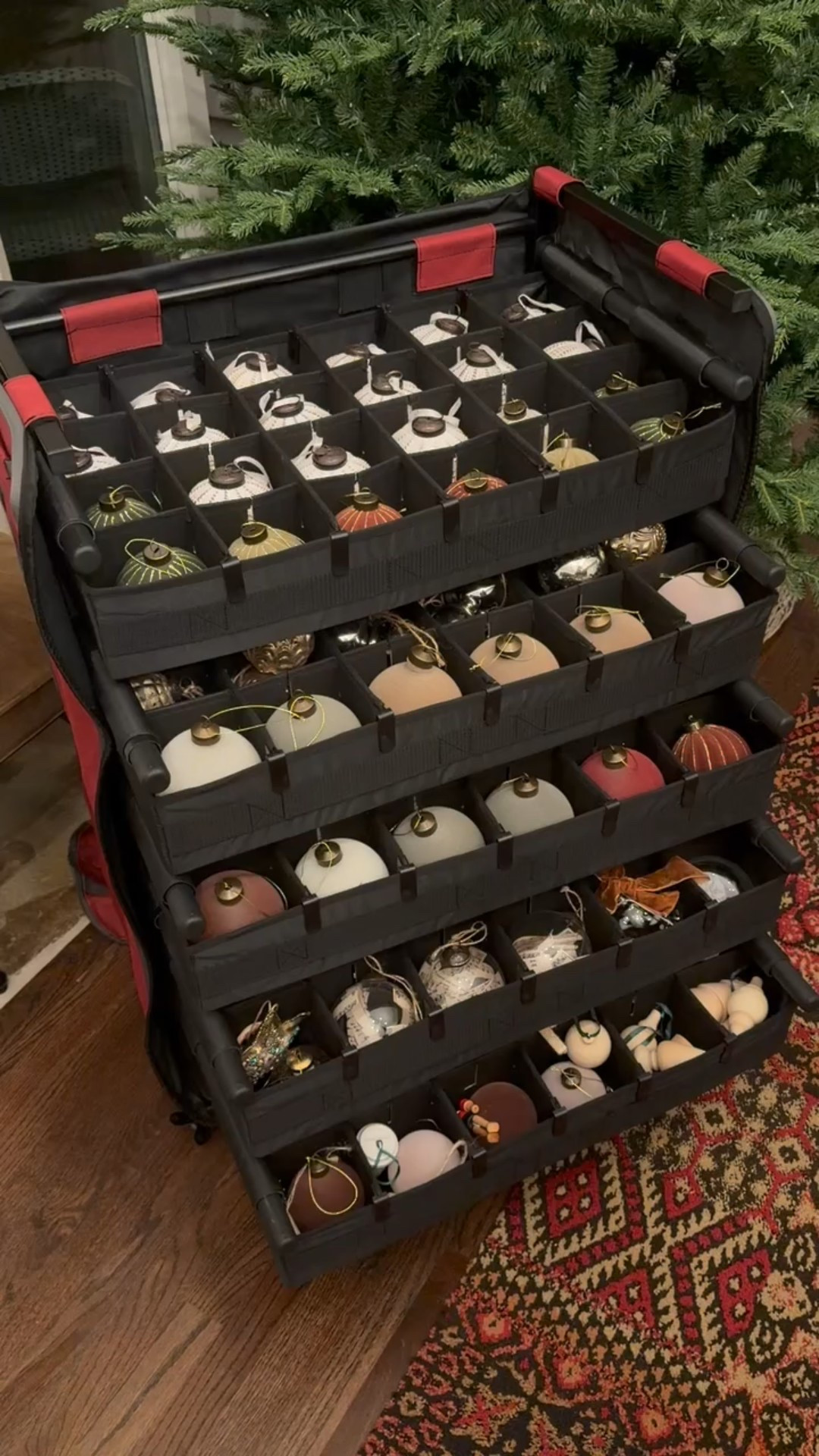Ornament storage season done right ✔️ This rolling ornament storage case keeps all our Christmas ornaments neatly separated, protected, and easy to move—no broken ornaments, no digging through bins. Storing everything right next to the artificial Christmas tree makes setup and takedown so much smoother.

#ornamentstorage #christmasorganization #holidaystorage #christmastree #homeorganization #eanesinteriors


#LTKSeasonal #LTKHome #LTKFindsUnder100