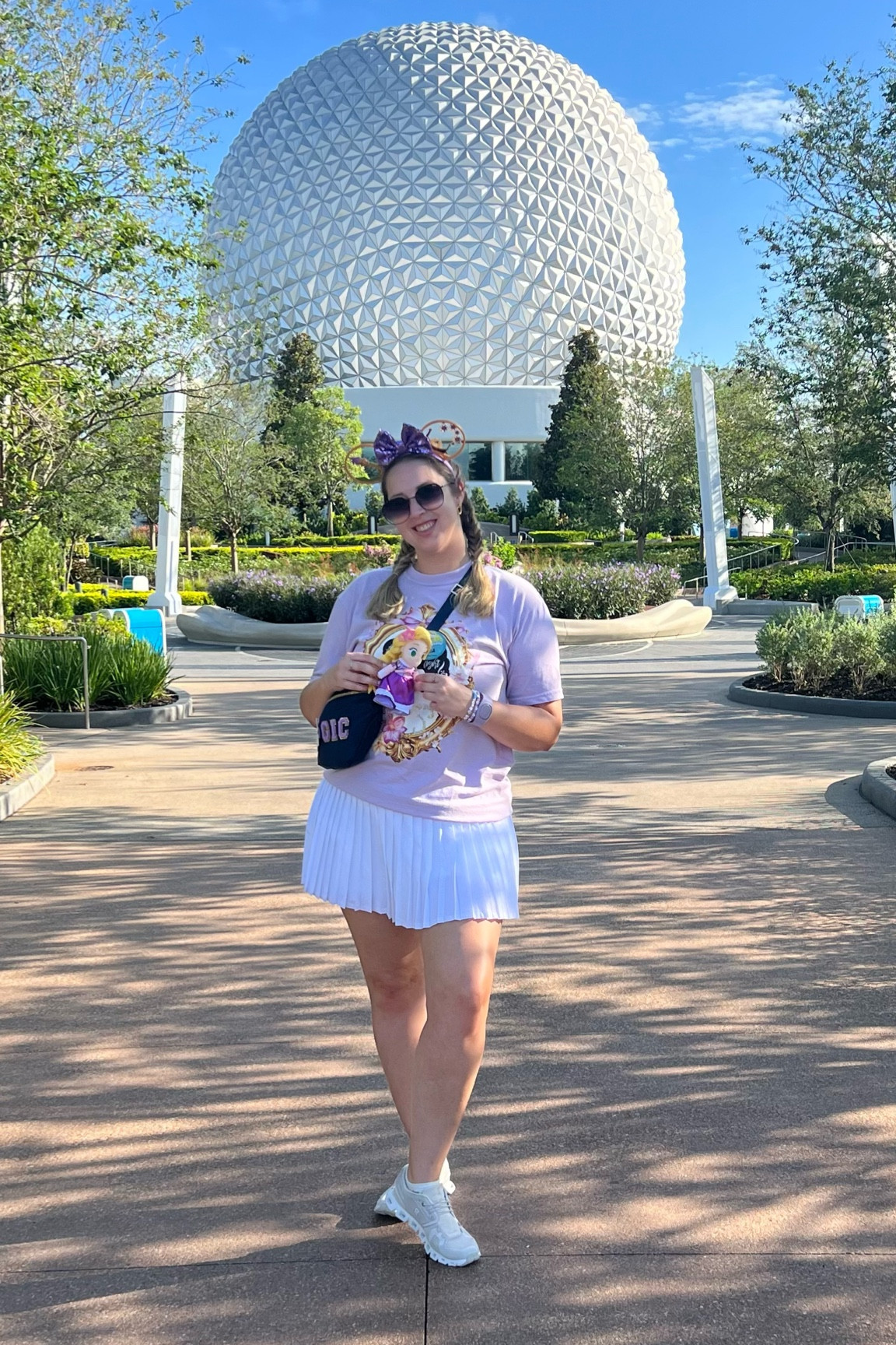 Epcot OOTD Rapunzel themed outfit - fitting pieces and co tangled couples portrait coquette shirt (size large), abercrombie white pleated skort (size large), on cloud x 5 white sneakers (size 9 1/2), tangled 3D Minnie ears from once upon a craft on Etsy, amazon belt bag with tangled patch, quay sunglasses and rapunzel nuimo from shopdisney 

Midsize, midsize outfit, size 10, ootd, Outfit inspo, princess finds, Disney parks Outfit, Disney bound,  under $50 outfit, affordable outfit, casual outfit, Disney rapunzel and flynn , Etsy finds, Disney outfit, Mickey ears, minimal Disney style, #ltkdisney, Disney ears, Disney aesthetic, theme park outfit, Disney parks outfit ideas, comfy Disney outfit, small business finds,

#LTKTravel #LTKFindsUnder50 #LTKMidsize