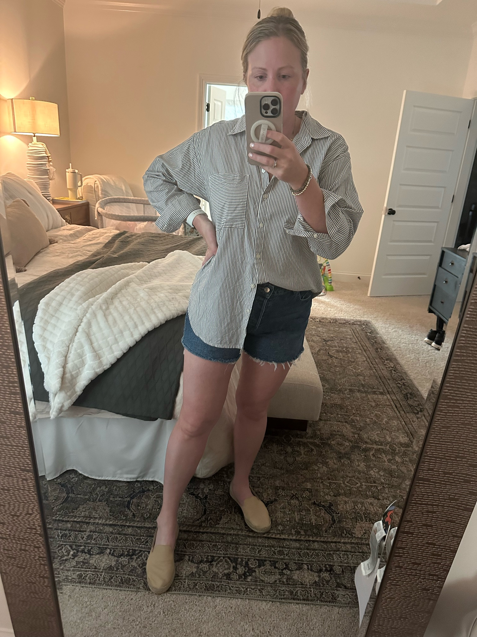 Oversized button down shirts are ESSENTIAL for this exclusively pumping mama. Just drop a wearable pump into a nursing bra and it’s tastefully hidden when you’re on the go 👏🏻  I stocked up on these cute and lightweight tops from Target that are SO CHEAP. And these high waisted jean shorts from H&M are *chef’s kiss* for postpartum.  #nursingtops #postpartumclothes #breastfeedingshirts 

#LTKBaby #LTKBump #LTKFindsUnder50