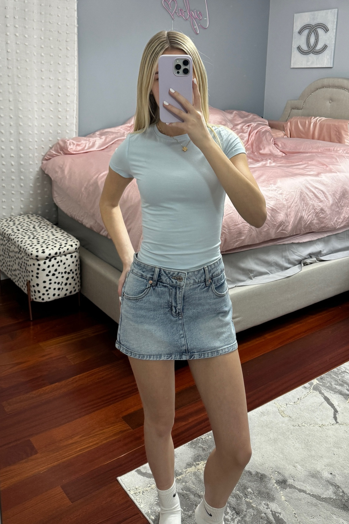 super cute summer outfit. Light blue shirt and denim micro skirt