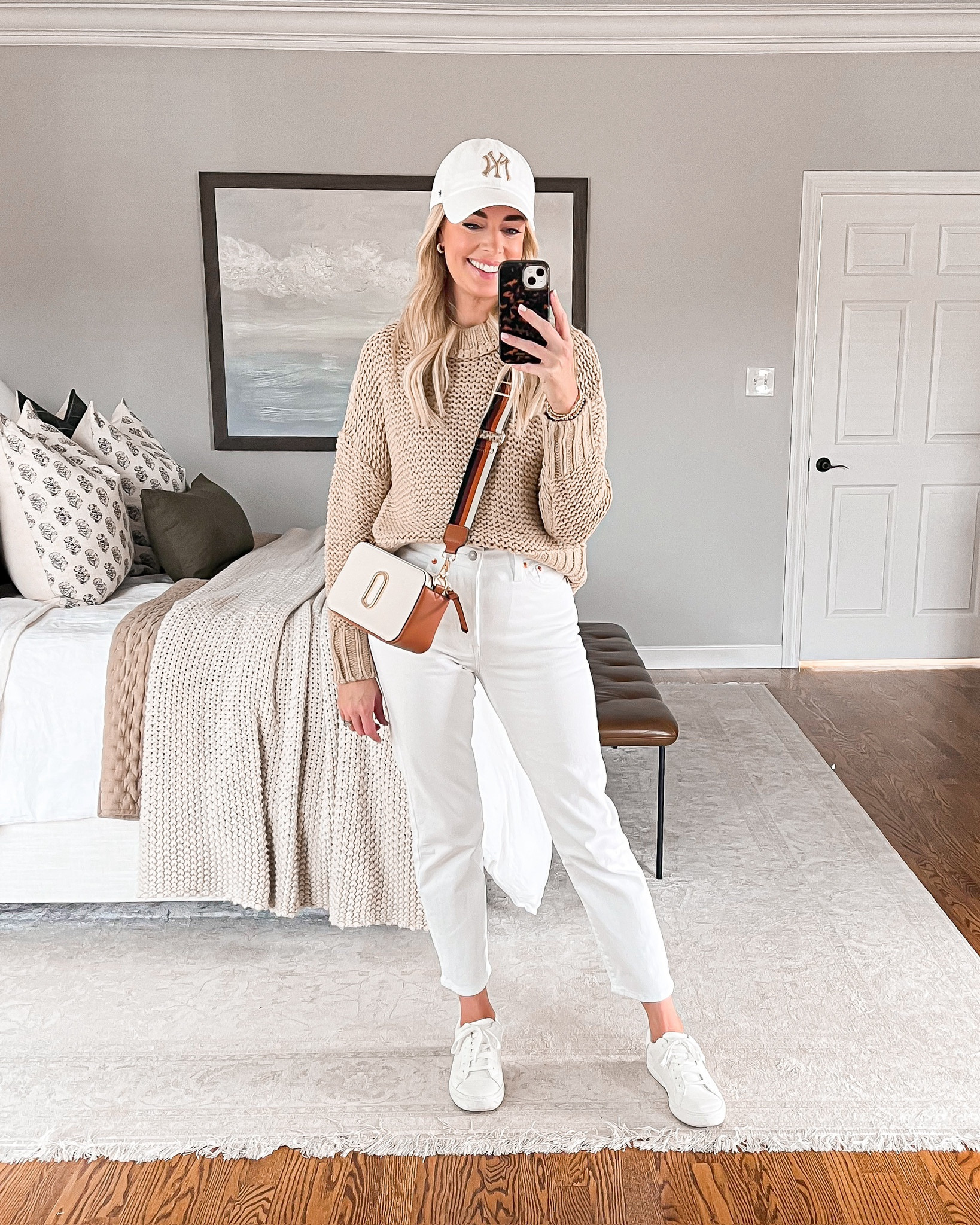 Amazon Casual Spring Outfit // love this look for spring!   These are the perfect white jeans for your spring wardrobe!  Wearing a size small in the sweater and a 27 in the jeans.  Everything fits true to size. Amazon sweater, white jeans, Levi’s jeans, spring outfit, casual spring outfit idea, white jeans outfit idea, summer sneakers, spring sneakers, casual outfit idea, spring sweater, white sneakers. 

#LTKSeasonal #LTKfindsunder50 #LTKstyletip