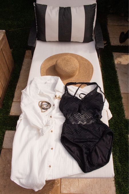 Resort wear or beach day outfit - black crochet one piece with white swim coverup and floppy beach hat. 

#LTKswim #LTKSeasonal #LTKtravel