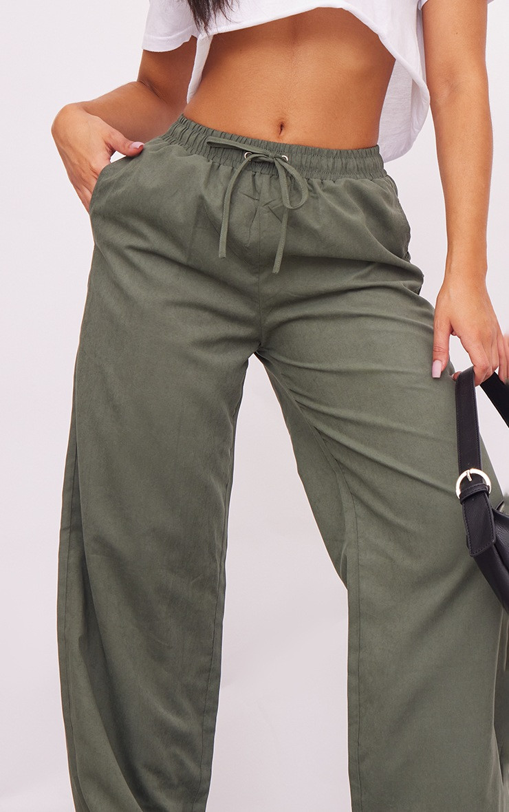 Petite Green Peach Skin Wide Leg Cargo Pants | PrettyLittleThing US