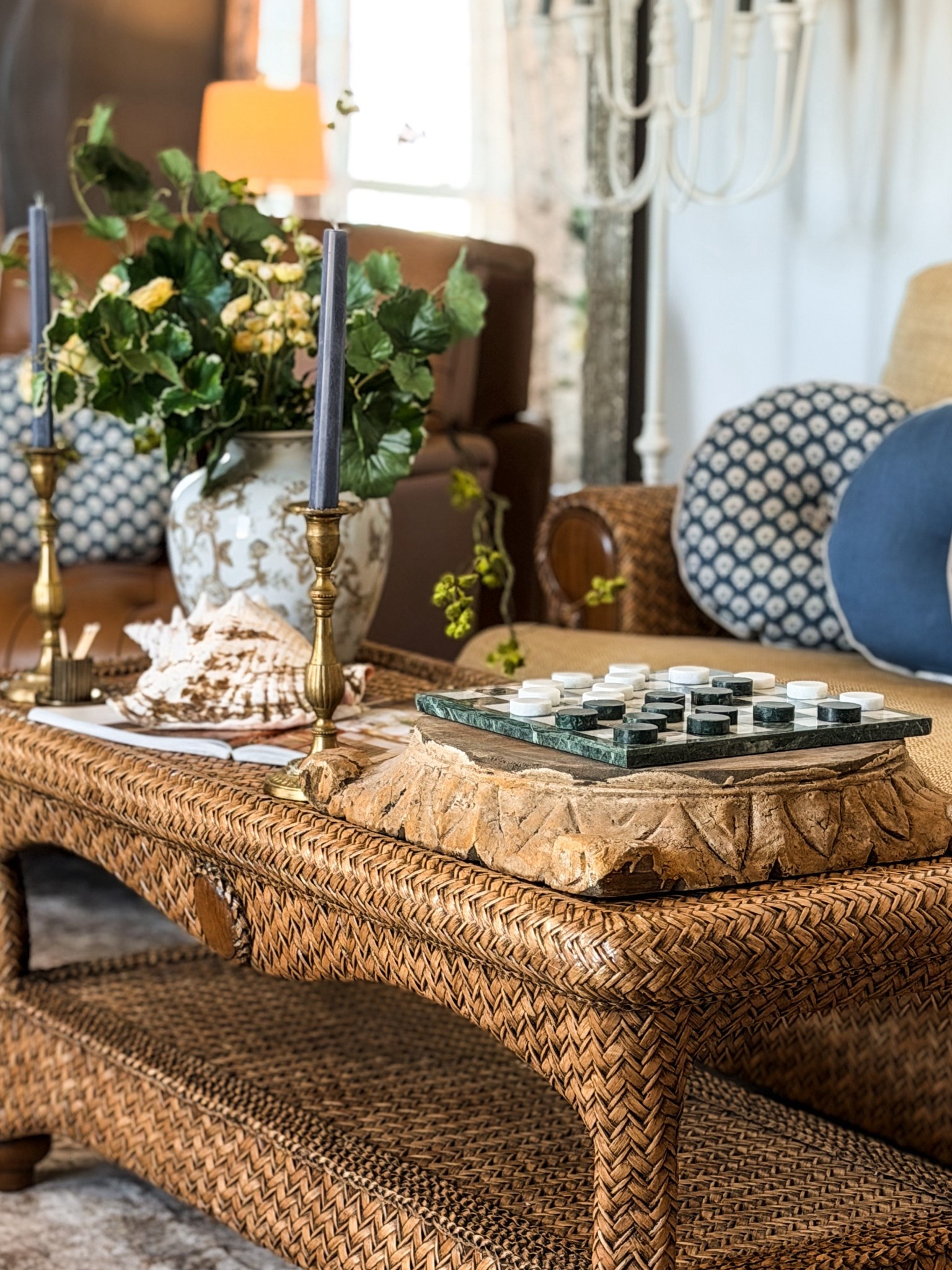 Our parlor is slowly finding its rhythm, one layered detail at a time. Designed for everyday living, not a themed moment, but a room that feels collected, lived in, & quietly intentional.

Even though we live at the beach, I am not drawn to coastal decor everywhere. This space, though, asked for it. The blue walls set the tone, & from there the softer coastal touches just made sense. Woven textures, aged brass, shells mixed with books, florals.

The wall color is Storm Chaser by Magnolia Home, which I get asked about often, & it continues to be one of my favorite paint choices in our home. It grounds the room while letting the lighter details breathe.

More layers & finishing touches are coming, but for now, here are a few quiet peeks as this room continues to come together, slowly & thoughtfully, just the way I love to design. 🤍 Happy weekend friend! xo, Krystle

#LTKHome #LTKSeasonal