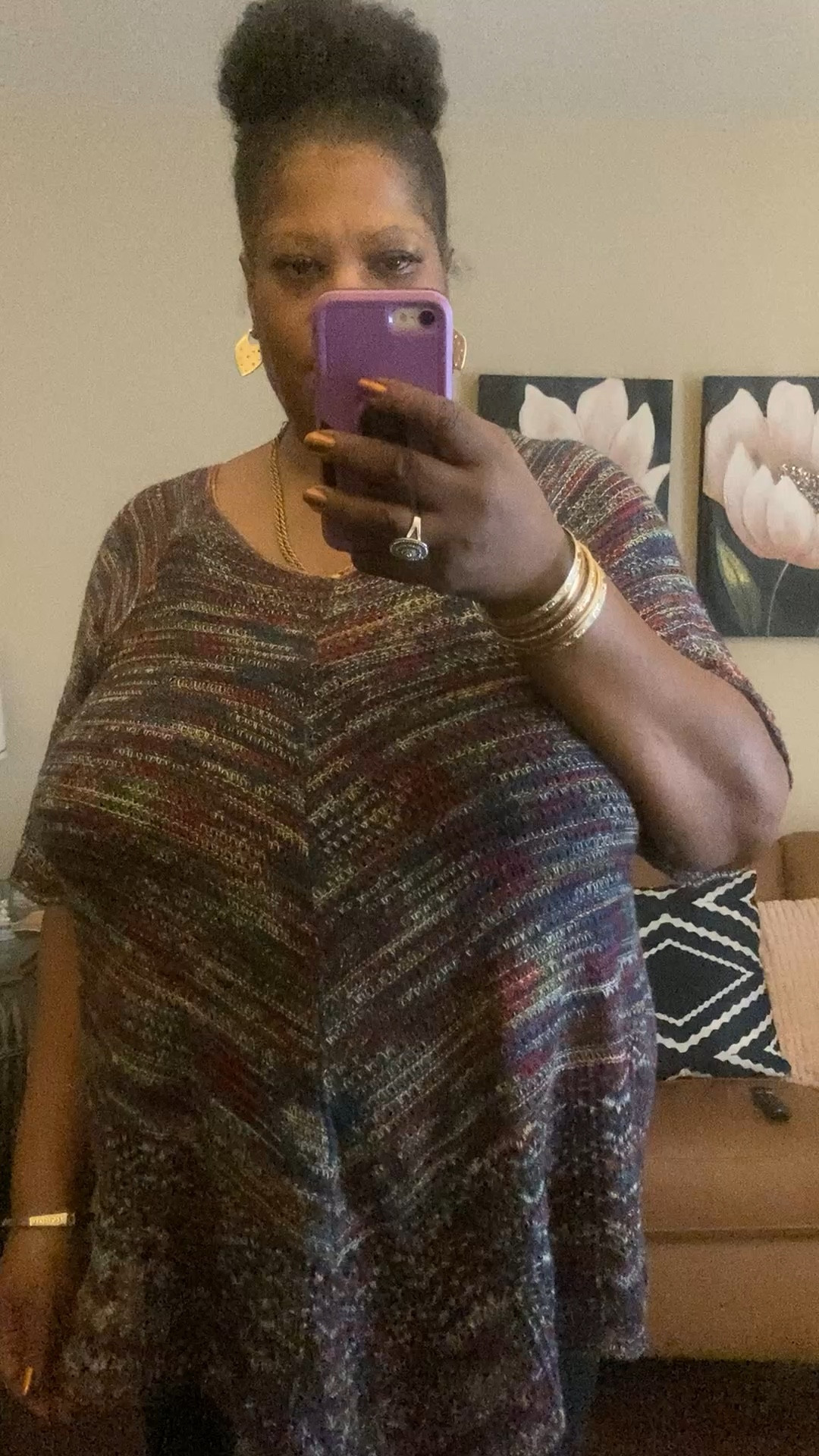 Plus size multicolored short sleeve sweater with black leggings and burgundy boots. This outfit is an easy, breezy outfit to throw on but still look pulled together and pretty. This is a fashion Inspo.

#LTKOver40 #LTKootd #LTKPlusSize