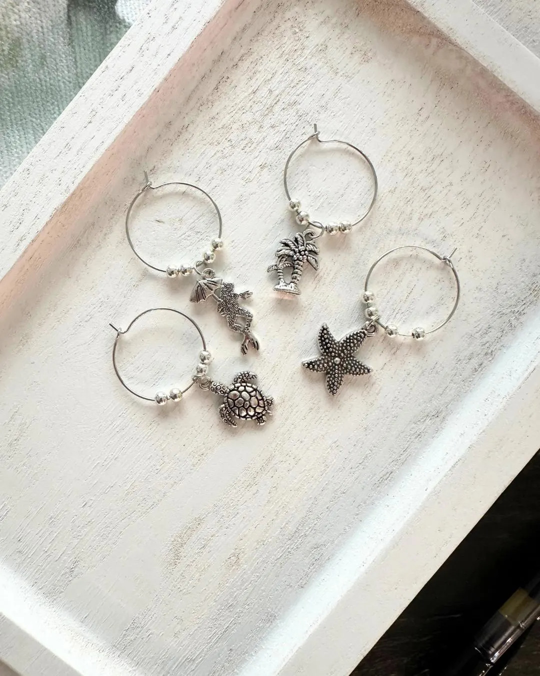 Use these ADORABLE silver tropical wine glass charms for your next girls night, bachelorette party, or even as a housewarming gift! Use code YASPLEASE for $1 off your next order!

#LTKfoodie #LTKHome #LTKWedding