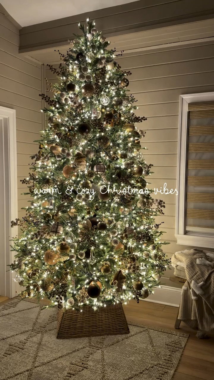 Warm & cozy vibes will always have my 🤎🎄

This is our main tree off of our living room & I absolutely love her! ✨ linked everything I could but most is older 🙏🏼 I get A LOT of my picks / stems from Hobby Lobby! Including the 🔔s 😌

Home decor / Christmas / magnolia / Lowe’s / Madison fir / naturals / Holley Gabrielle 

#LTKHoliday #LTKSeasonal #LTKHome