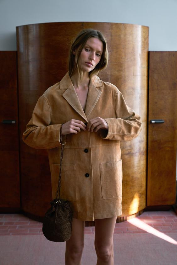 Jacket with main fabric made of 100% leather. Lapel collar and long sleeves. Front patch pockets.... | Zara US
