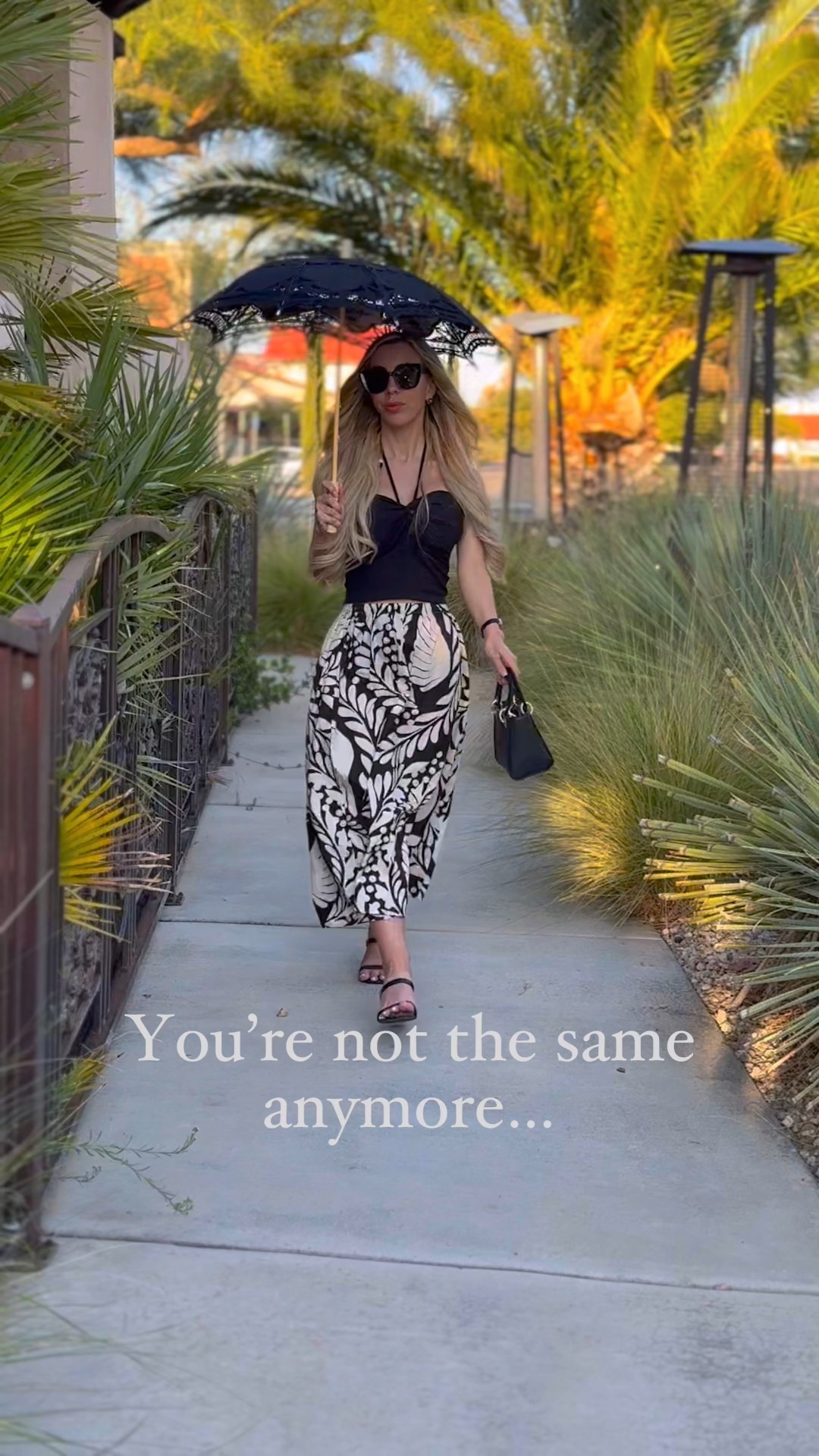 Perfect dinner outfit! A black halter neck top paired with a floral black and white midi skirt. So comfy and cute! 

#LTKStyleTip #LTKBeauty #LTKFindsUnder100