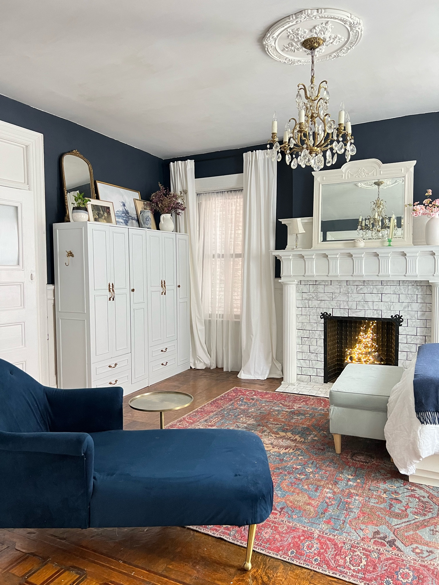 Bedroom sources 

Wardrobe, chaise, blue velvet bench, rug, curtains, crystal chandelier, gold side table, storage bench 

#LTKsalealert #LTKhome #LTKstyletip