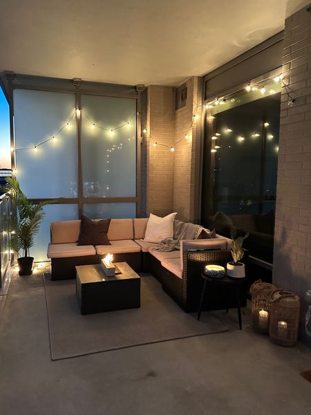 Apartment balcony makeover! Lanterns are old target, but linked similar. My pillows and throw blanket are IKEA and I can’t link them. I linked similar, but here are the  IKEA names: 

FJÄDRAR (insert)
SANELA (covers) 
ASPSVÄRMARE (blanket) 

#outdoorspace #apartmenttherapy #balconydecor #patiodecor 

