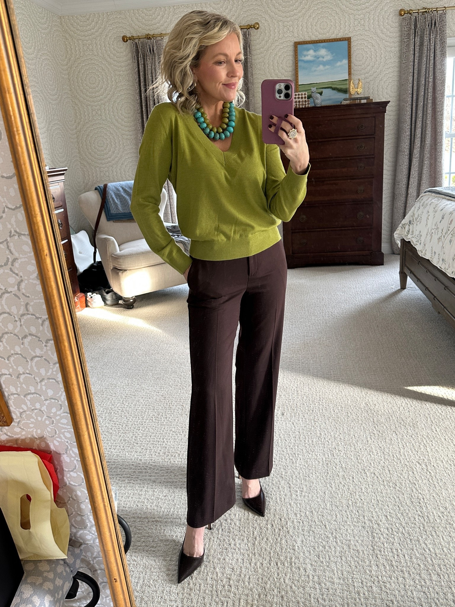 Wearing an XS in the sweater and Petite 0  