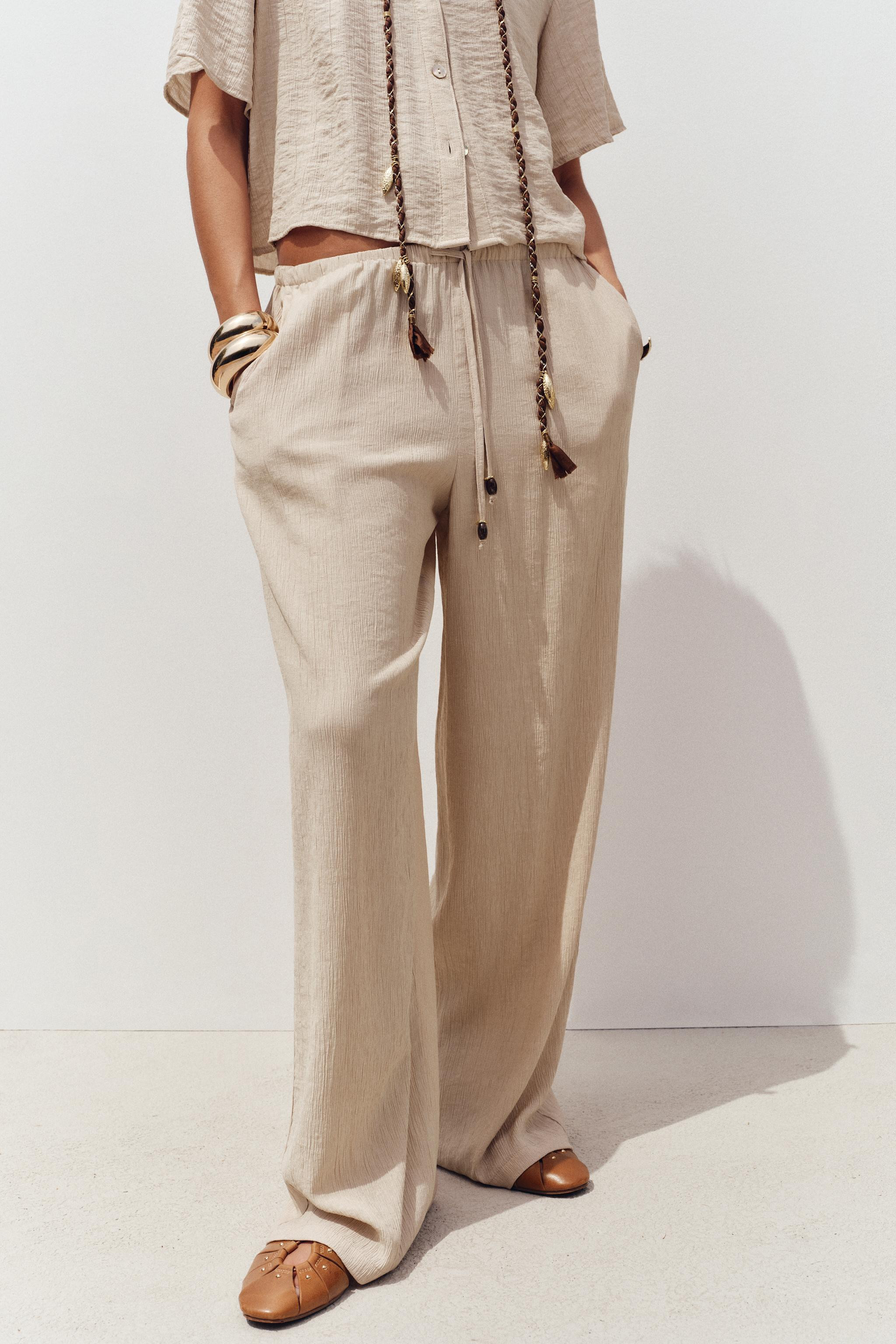 WIDE-LEG TROUSERS WITH ELASTIC WAISTBAND | Zara UK