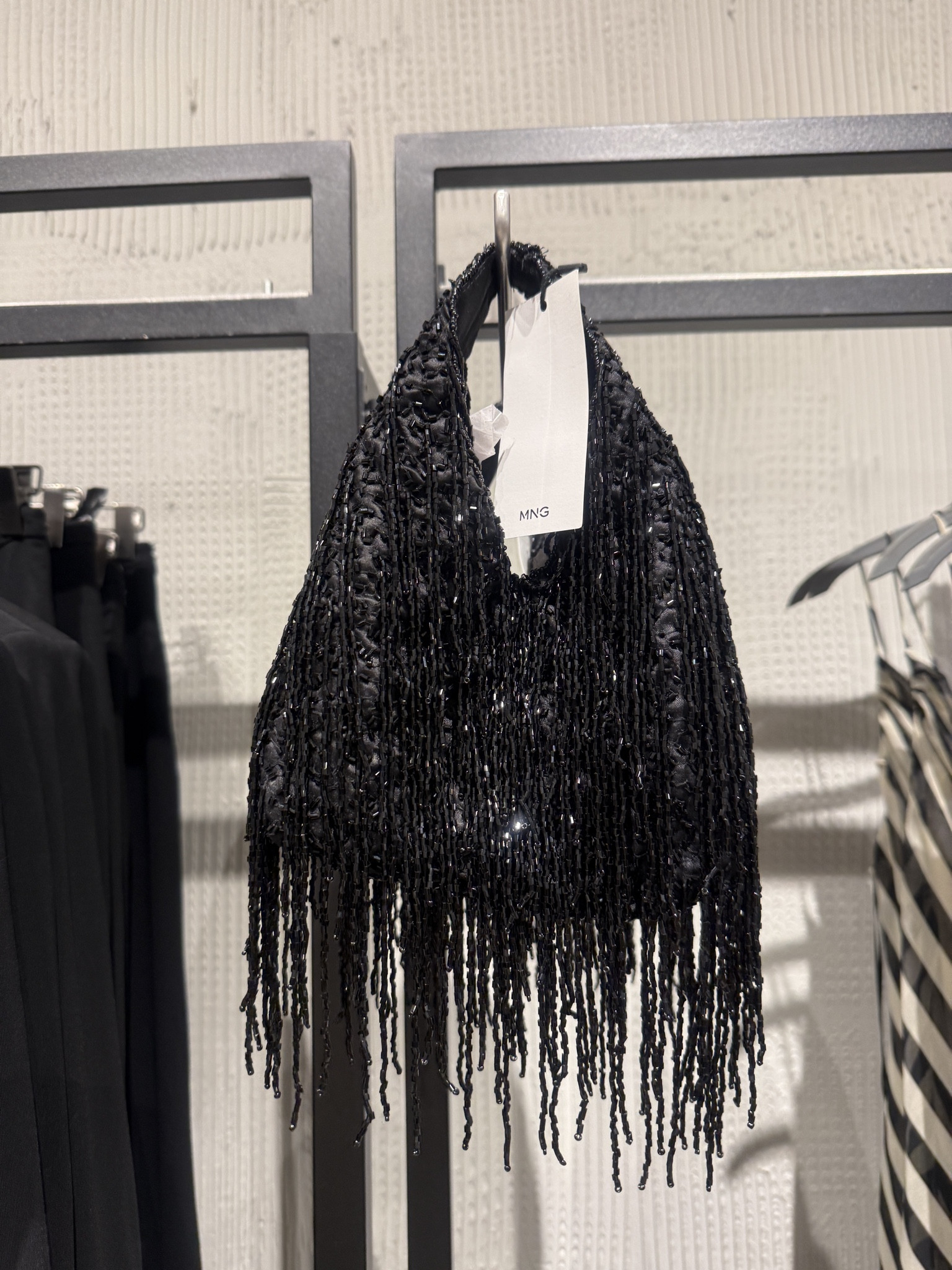 Cutest beaded bag in black for summer from Mango. It's very sparkly in person!  

 #LTKSeasonal