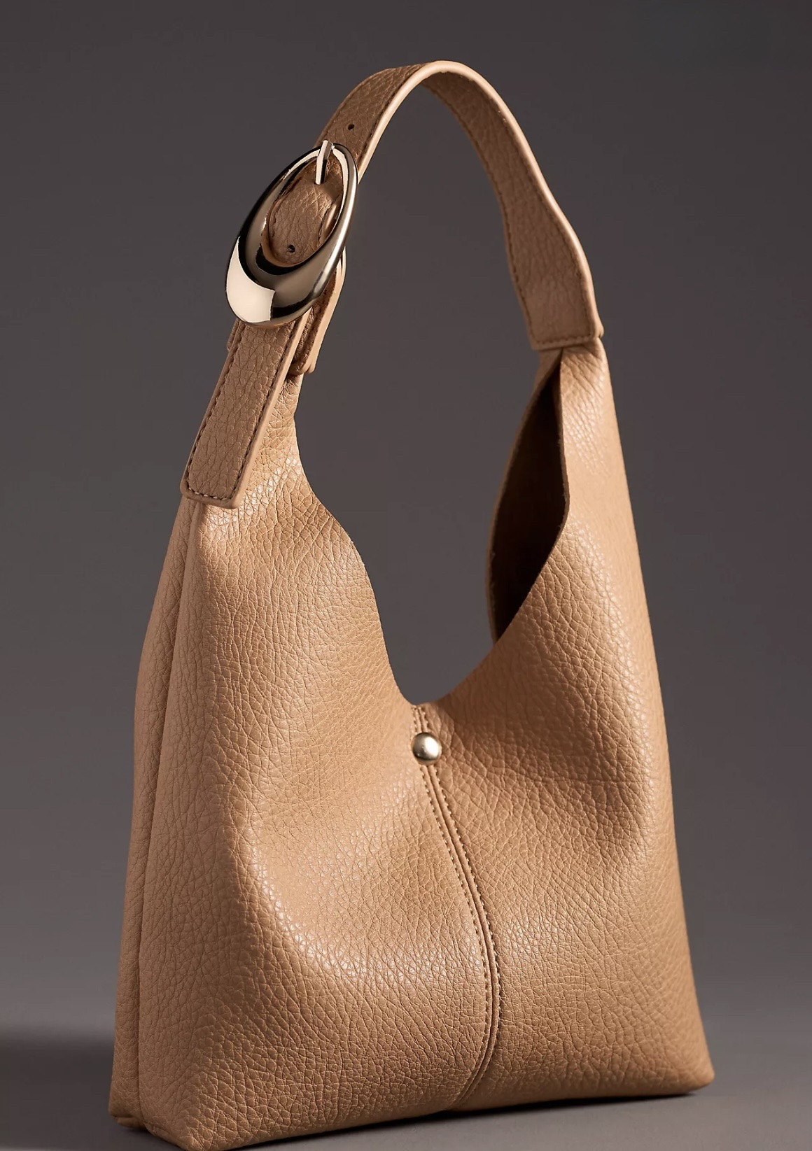 Trending now: The Love Knot Slouchy Bag from Anthropologie in different sizes and materials. All linked. 

#LTKFindsUnder100 

#LTKSeasonal #LTKWorkwear