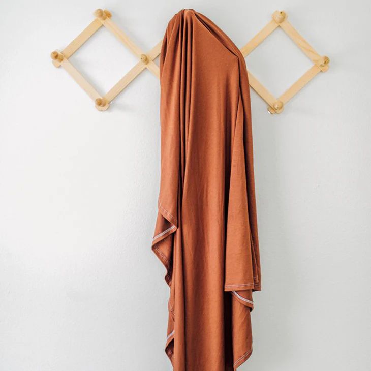 Jersey Stretch Swaddle, Solid Rust | SpearmintLOVE