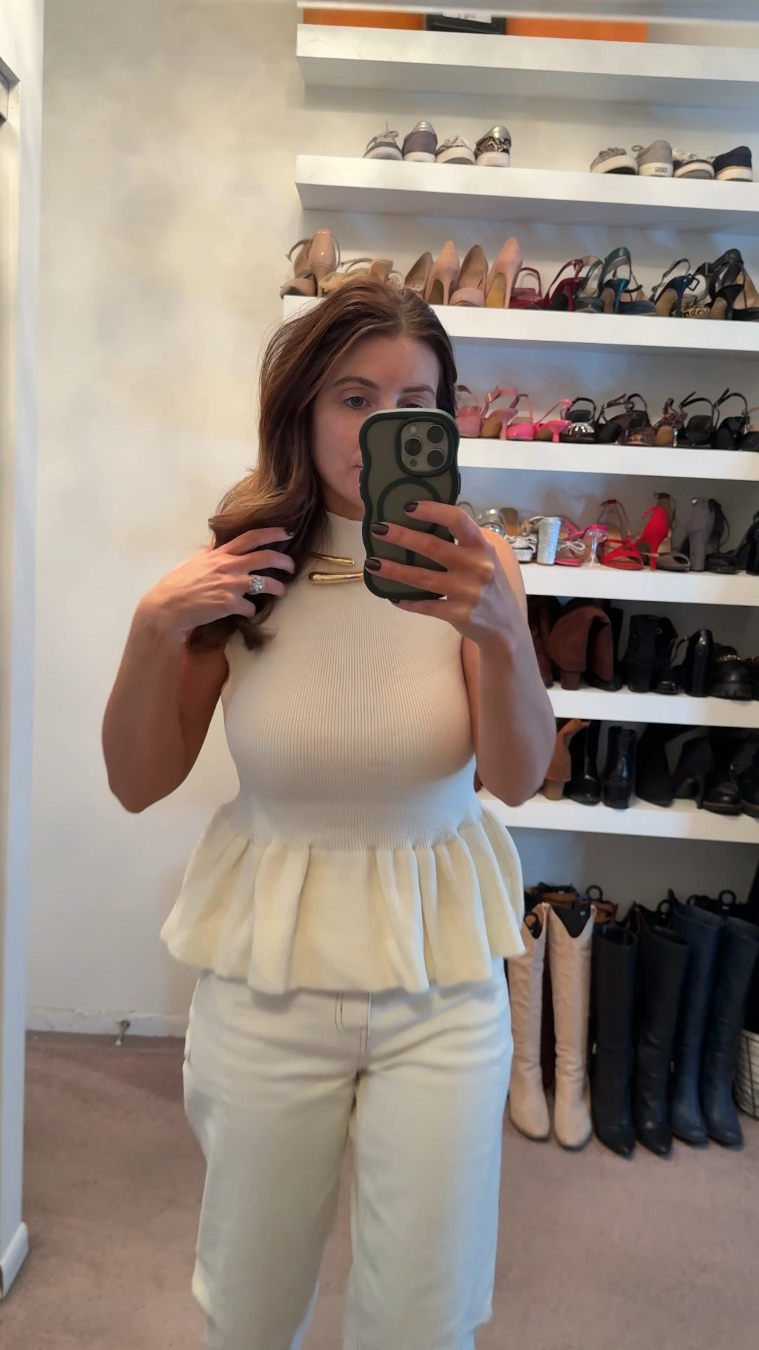 Casual spring outfit, cream sleeveless peplum sweater (wearing a size medium), off white barrel leg jeans (wearing a size 2), brown mesh ballet flats, forest green clutch, gold jewelry, casual outfit, spring outfit, easy outfit, elevated basics, style on a budget 

#LTKOver40 #LTKSaleAlert #LTKootd